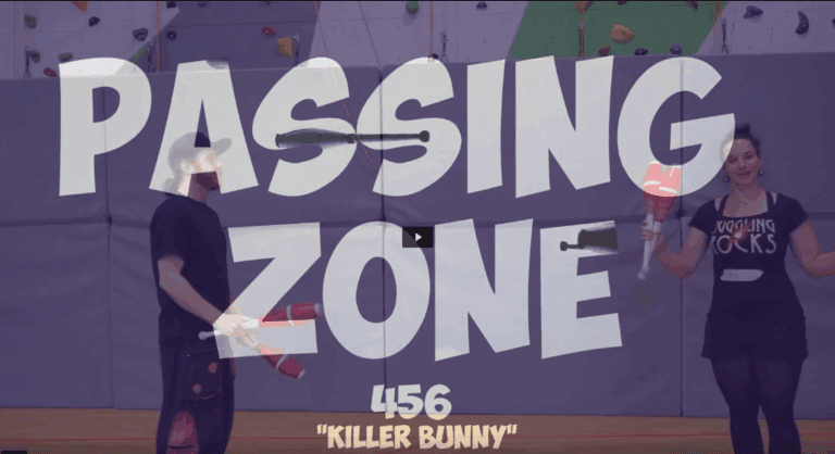 Two jugglers with clubs, "Passing Zone 456 - Killer Bunny" title overlay - Passing Zone