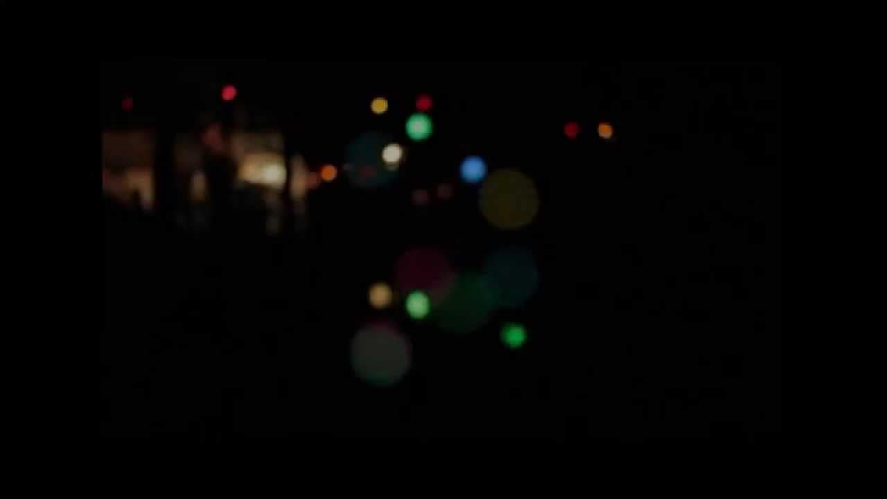 Blurred lights at night, possibly holiday decorations, for Glowminute blog. - Passing Zone