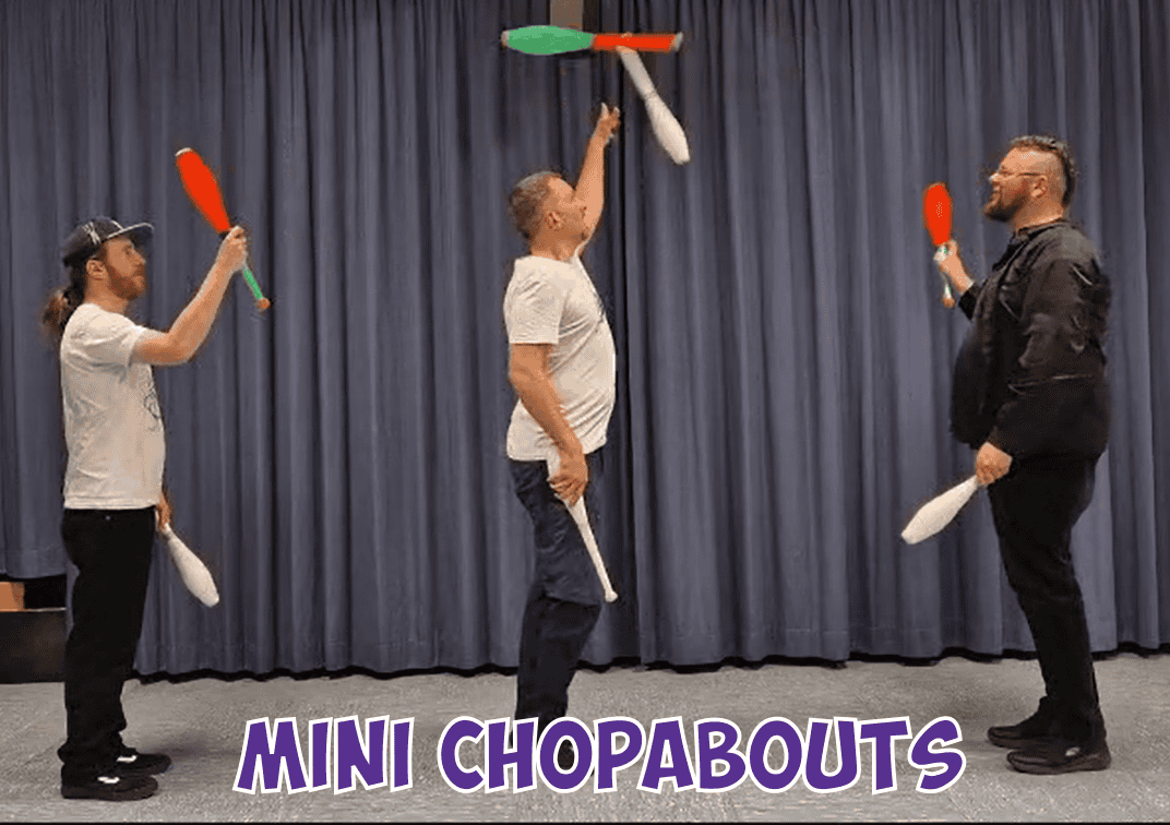 Three jugglers performing "Mini Chopabouts" with juggling clubs. - Passing Zone